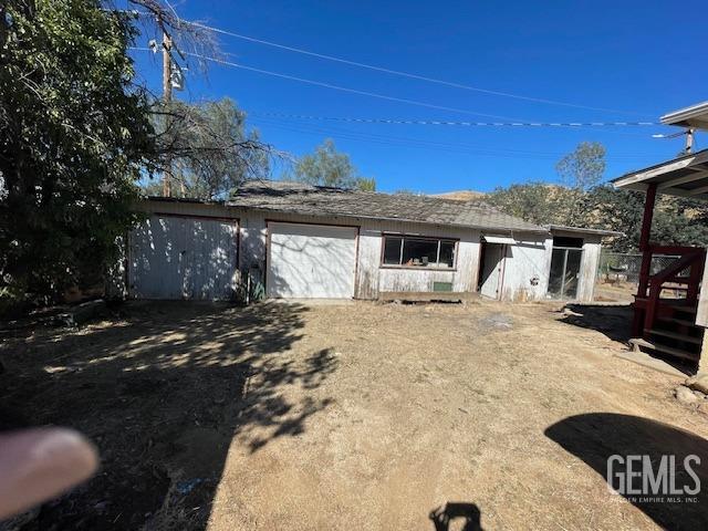 Undisclosed Address Bodfish, CA 93205 - Photo 18 of 19 a front view of a house with a yard