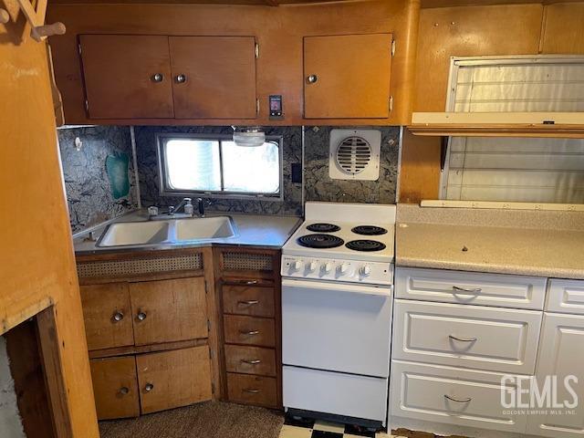 Undisclosed Address Bodfish, CA 93205 - Photo 5 of 19 a kitchen with a stove cabinets and window