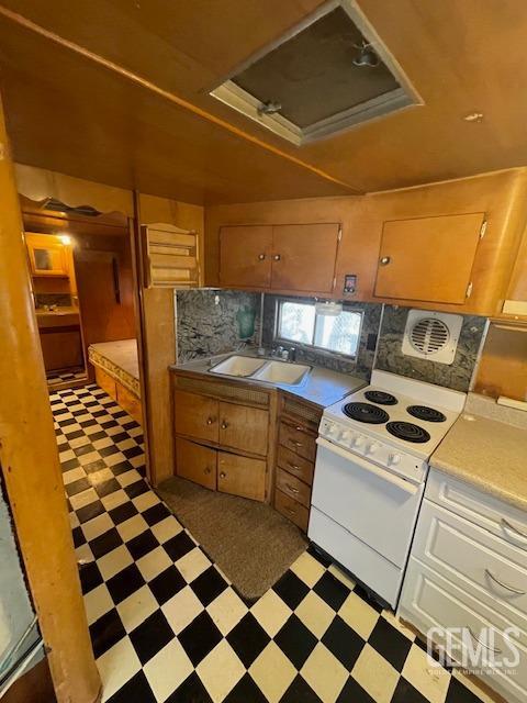 Undisclosed Address Bodfish, CA 93205 - Photo 8 of 19 a kitchen with a stove a sink and a refrigerator