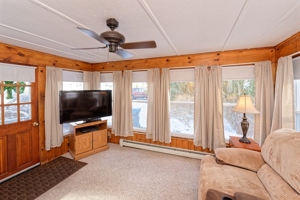 17 Blackman Road Canton, MA 02021 - Photo 14 of 36 a living room with furniture and a flat screen tv