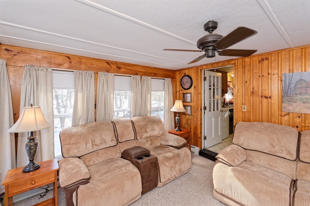 17 Blackman Road Canton, MA 02021 - Photo 15 of 36 a living room with furniture a ceiling fan and a window
