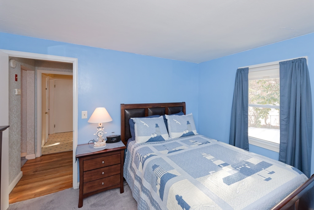 17 Blackman Road Canton, MA 02021 - Photo 18 of 36 a bedroom with a bed and a window