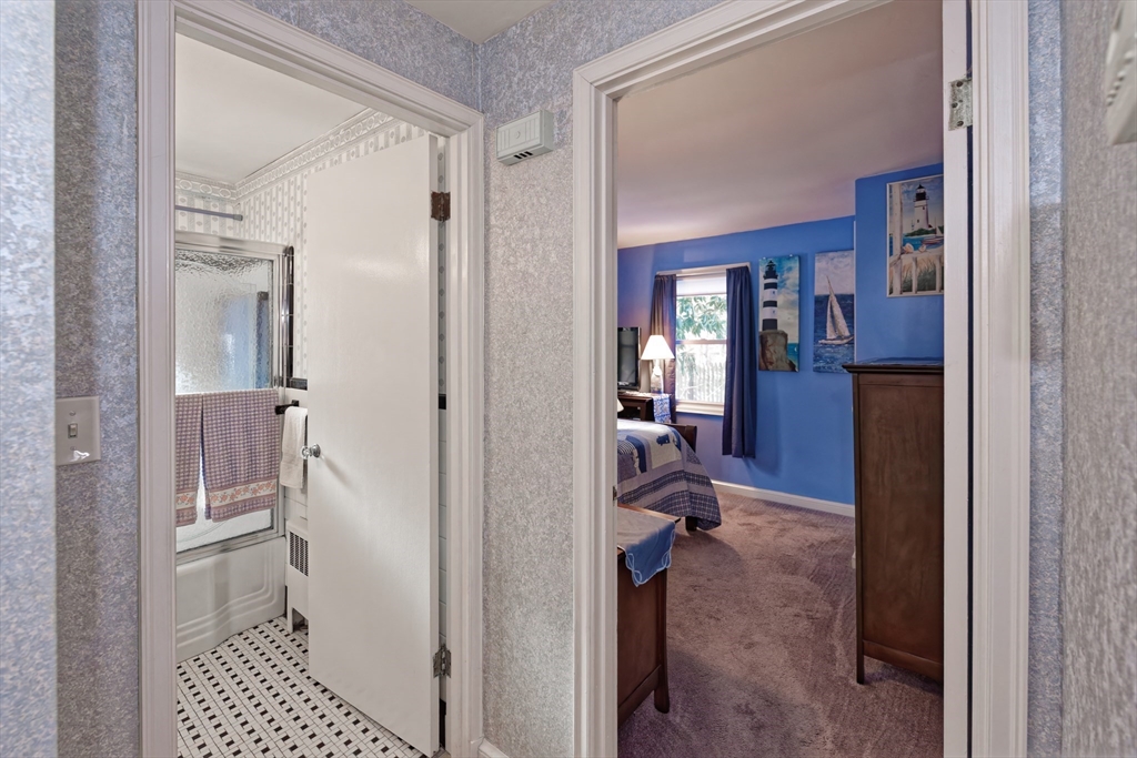 17 Blackman Road Canton, MA 02021 - Photo 19 of 36 a view of a hallway with bathroom and wooden floor