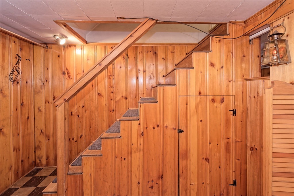 17 Blackman Road Canton, MA 02021 - Photo 24 of 36 a view of a balcony with wooden walls and stairs