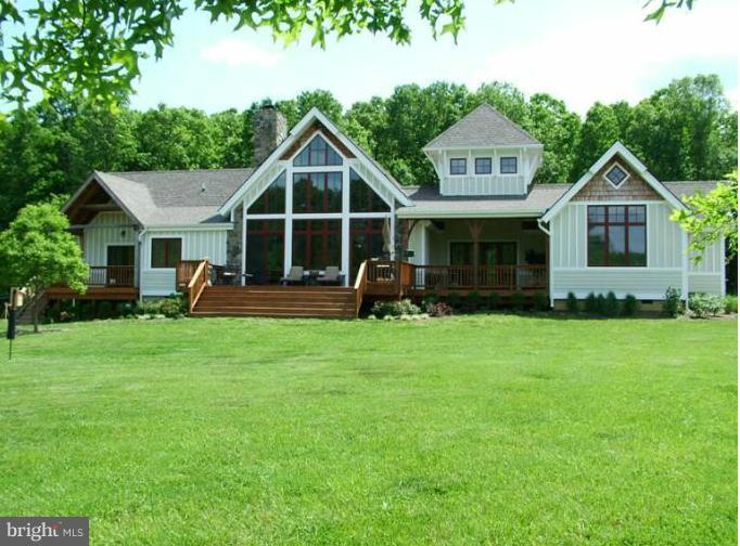 20163 Unison Road Round Hill, VA 20141 - Photo 3 of 20 a front view of a house with garden