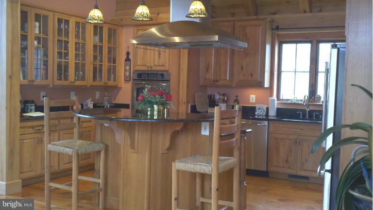 20163 Unison Road Round Hill, VA 20141 - Photo 10 of 20 a kitchen with a sink cabinets and window