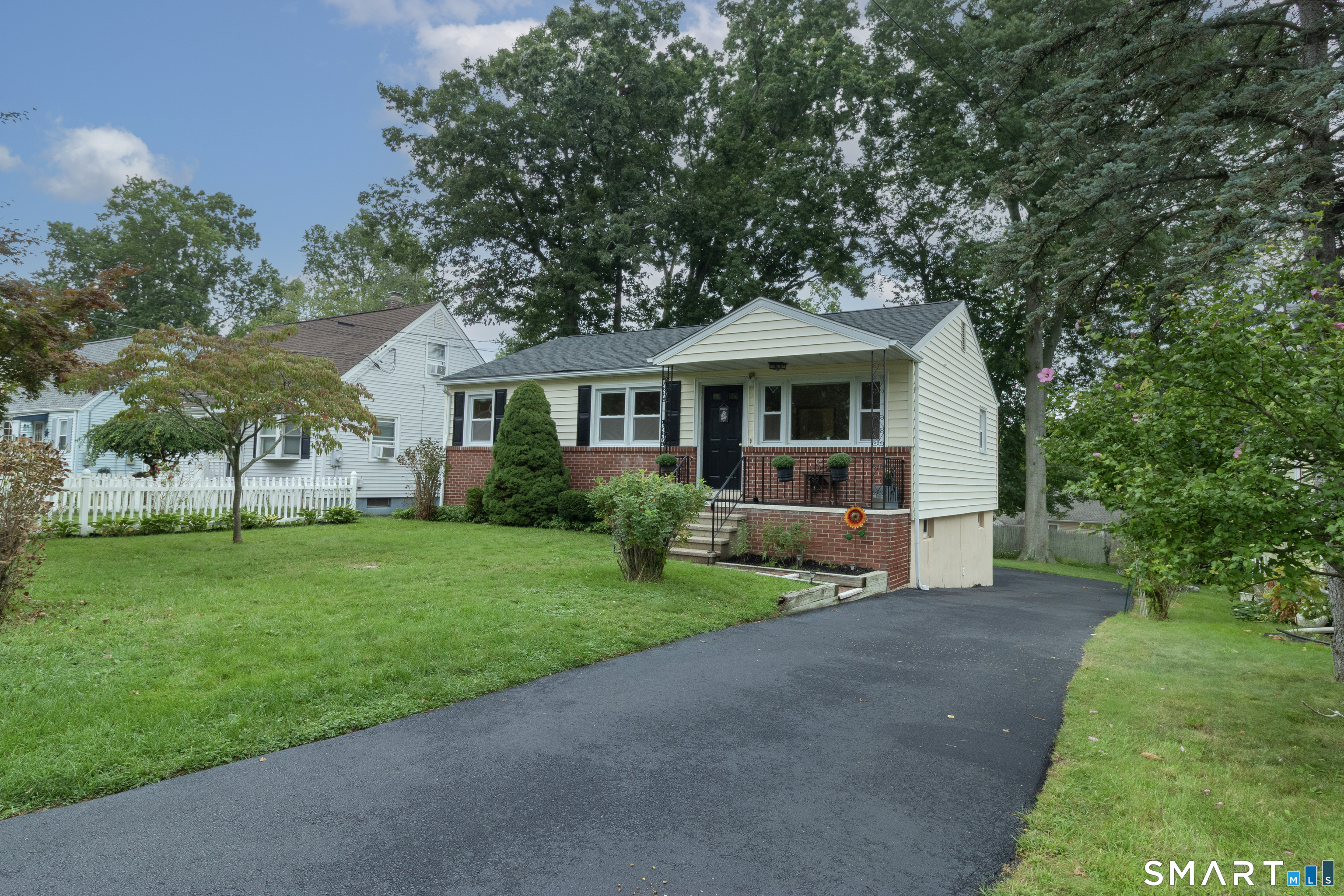 17 Honor Road West Haven, CT 06516 - Photo 3 of 40 Note the recently paved driveway which extends to the rear of the house and to the 1 car garage.