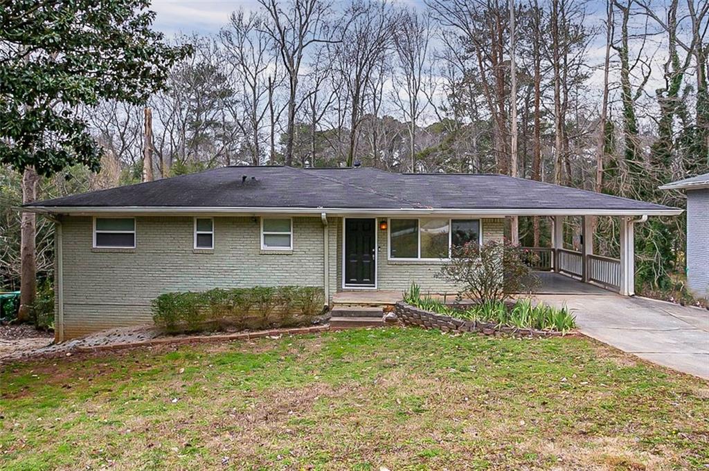 3495 Tulip Drive Decatur, GA 30032 - Photo 1 of 1 a front view of a house with garden
