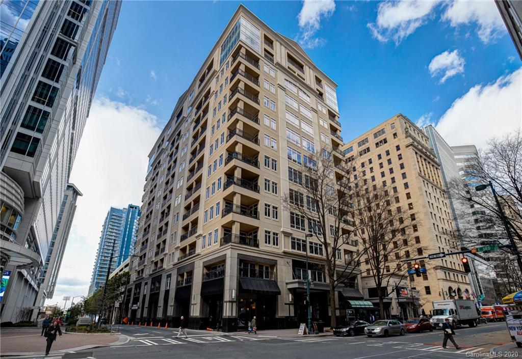 230 South Tryon Street, Unit 305 Charlotte, NC 28202 - Photo 1 of 32 a view of a building and a street