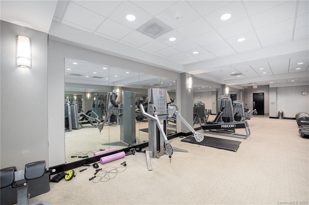 230 South Tryon Street, Unit 305 Charlotte, NC 28202 - Photo 23 of 32 a view of a room with gym equipment