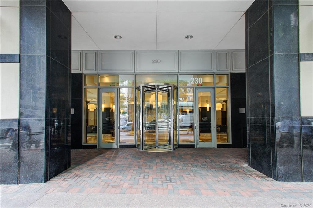 230 South Tryon Street, Unit 305 Charlotte, NC 28202 - Photo 32 of 32 a view of a room with large windows