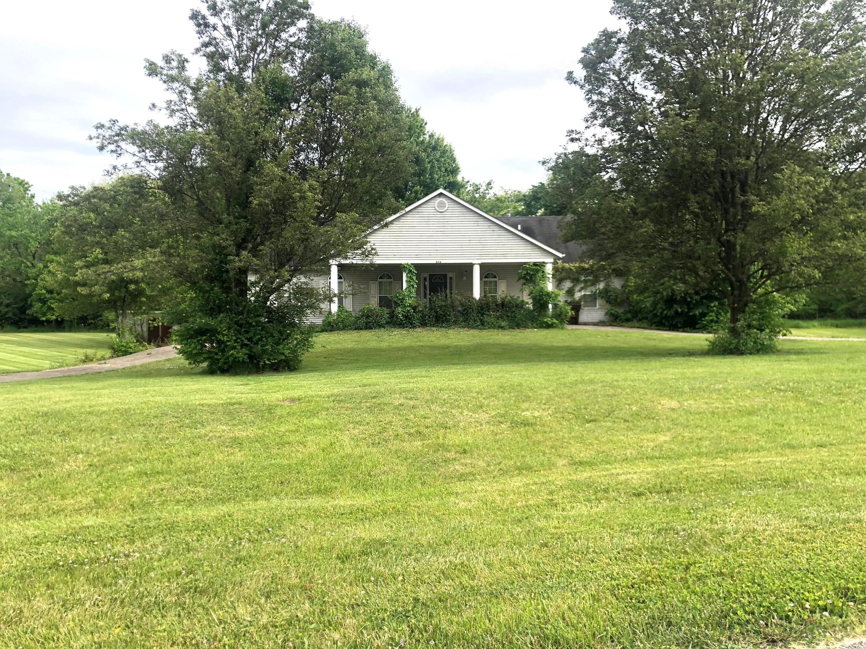 HANDYMAN SPECIAL! DIAMOND IN THE ROUGH WON'T LAST LONG. 1.8 ACRES APPROXIMATELY.