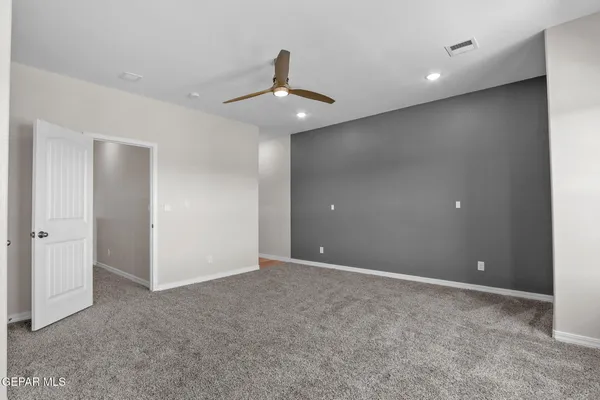 a view of a room with racks on the wall