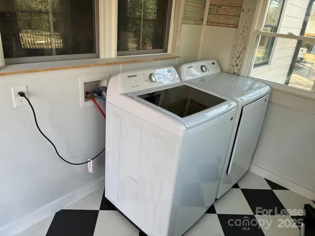 a utility room with dryer and washer