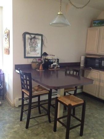 20 Spring Street Ware, MA 01082 - Photo 12 of 41 a view of a dining room with furniture