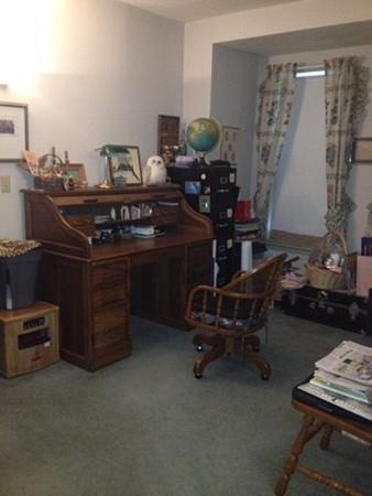 20 Spring Street Ware, MA 01082 - Photo 21 of 41 a room with furniture and musical instruments