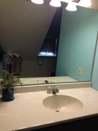 20 Spring Street Ware, MA 01082 - Photo 28 of 41 a bathroom with a sink and a mirror