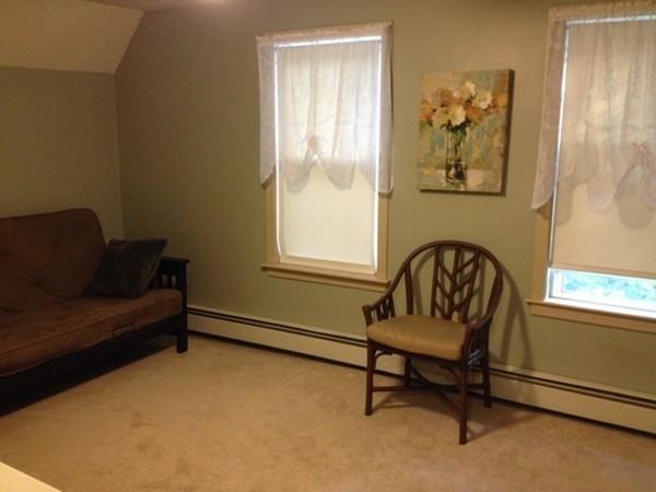 20 Spring Street Ware, MA 01082 - Photo 30 of 41 a living room with furniture and a window