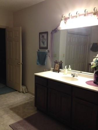 20 Spring Street Ware, MA 01082 - Photo 41 of 41 a bathroom with a sink and a mirror