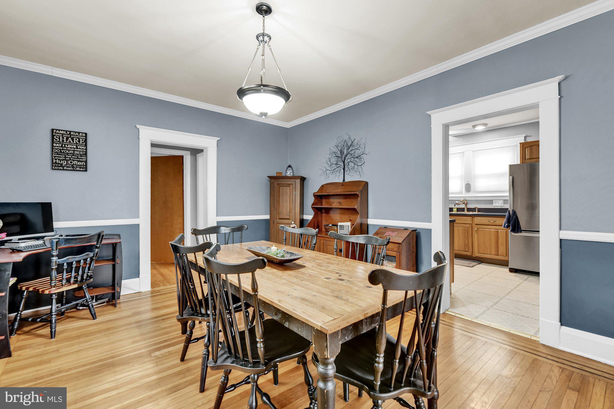 648 Aldershot Road Baltimore, MD 21229 - Photo 11 of 39 A generous dining room for gathering with family