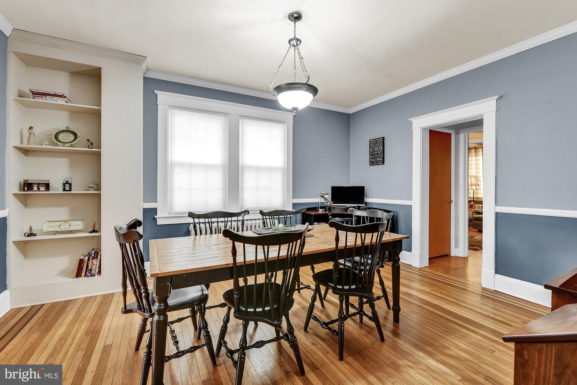 648 Aldershot Road Baltimore, MD 21229 - Photo 12 of 39 Dining Room with built-in bookcase