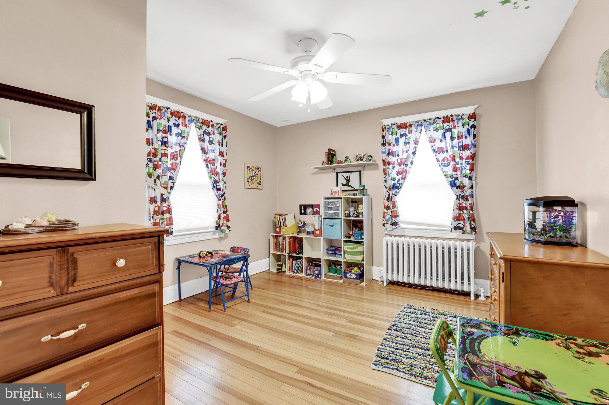 648 Aldershot Road Baltimore, MD 21229 - Photo 32 of 39 Bedroom with hardwood flooring and ceiling fan