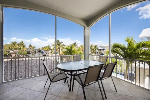 a view of an outdoor dining space with furniture