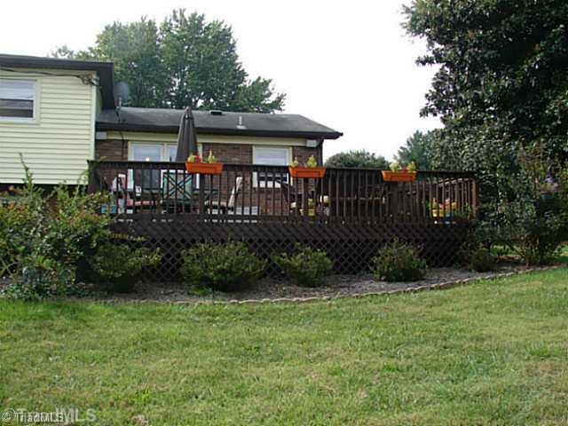 214 Farmstead Road King, NC 27021 - Photo 15 of 16 Patio/Deck. Mature landscaping