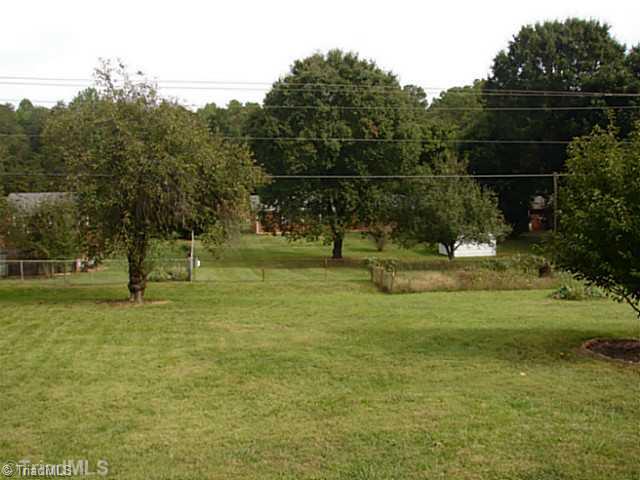 214 Farmstead Road King, NC 27021 - Photo 16 of 16 Yard/Garden. 1/2 acre fenced yard with garden area and storage building