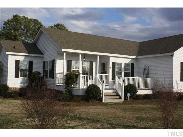 925 Quarterhorse Road Princeton, NC 27569 - Photo 4 of 21 FRONT PORCH WITH METAL RAILING