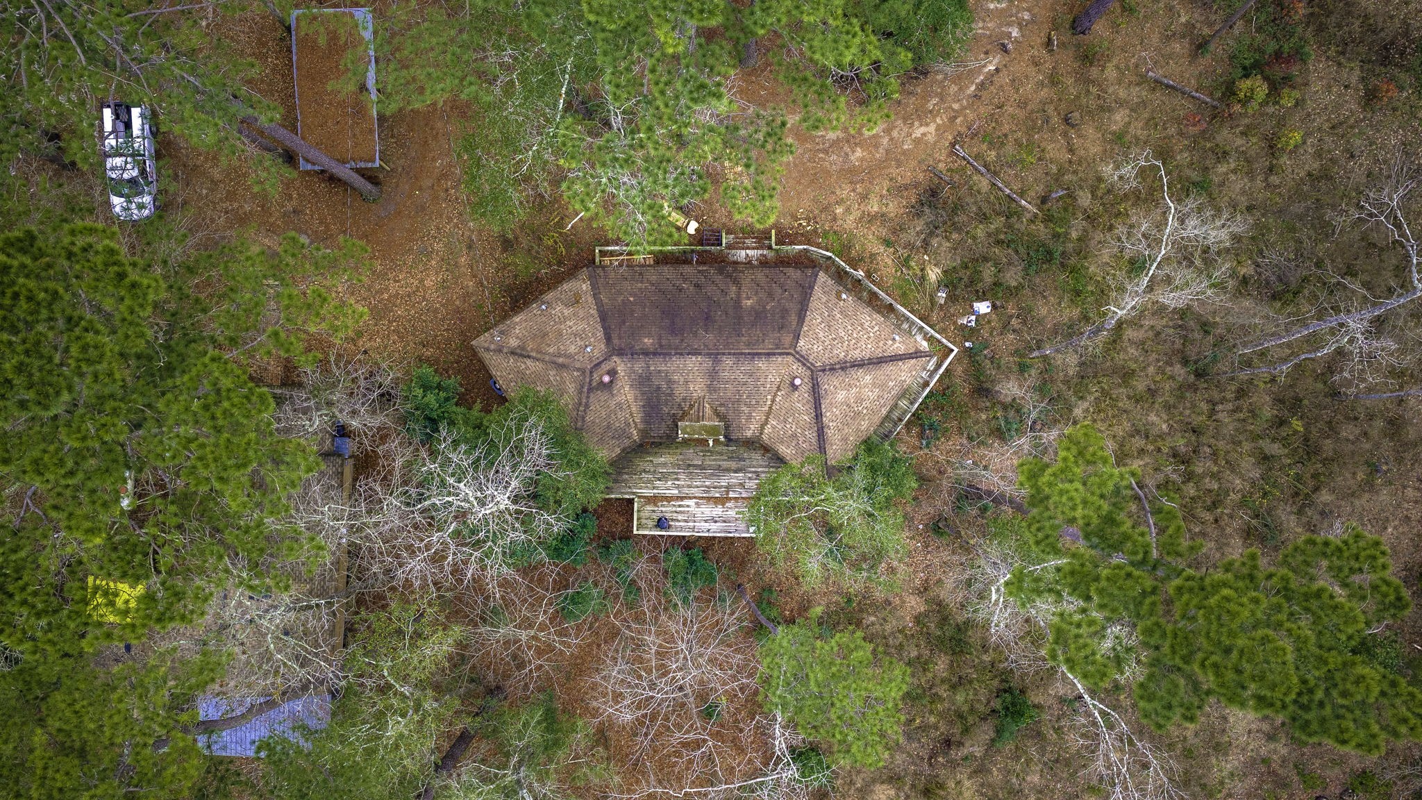 1542 Hillbilly Heaven Road Livingston, TX 77351 - Photo 20 of 27 a aerial view of a house with a yard and large trees