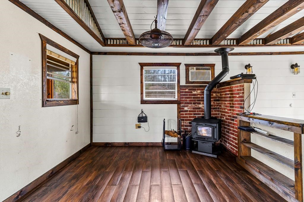 1542 Hillbilly Heaven Road Livingston, TX 77351 - Photo 23 of 27 a view of livingroom with furniture and wooden floor