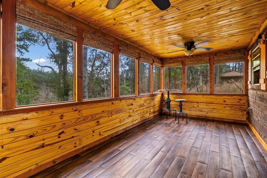 1542 Hillbilly Heaven Road Livingston, TX 77351 - Photo 27 of 27 a view of two chairs in the balcony