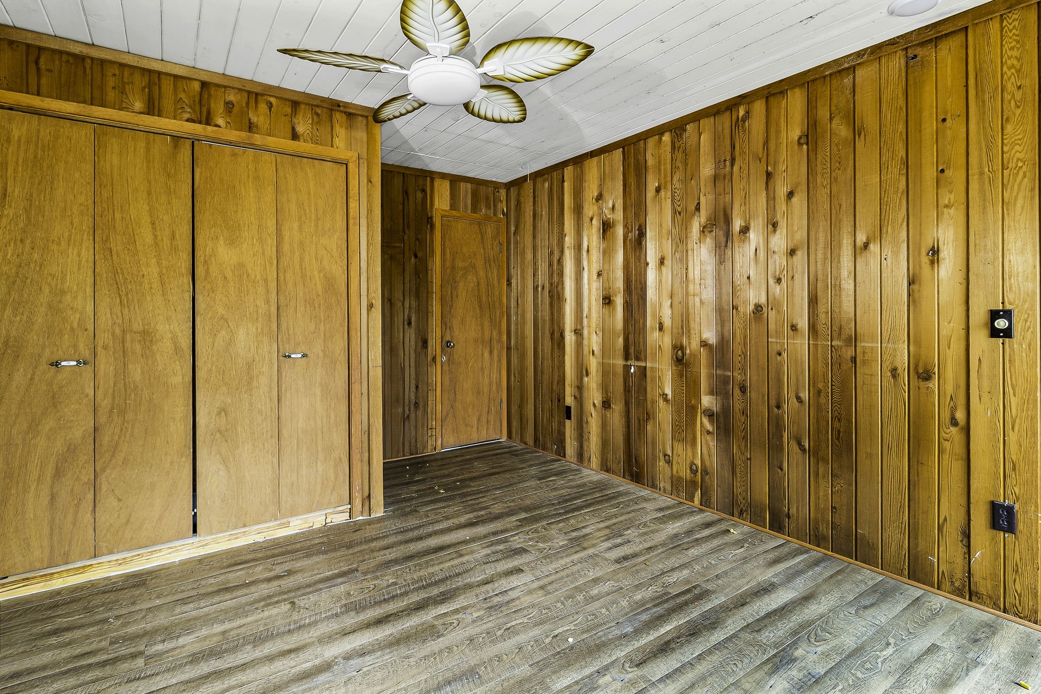 1542 Hillbilly Heaven Road Livingston, TX 77351 - Photo 7 of 27 a view of a room with wooden walls