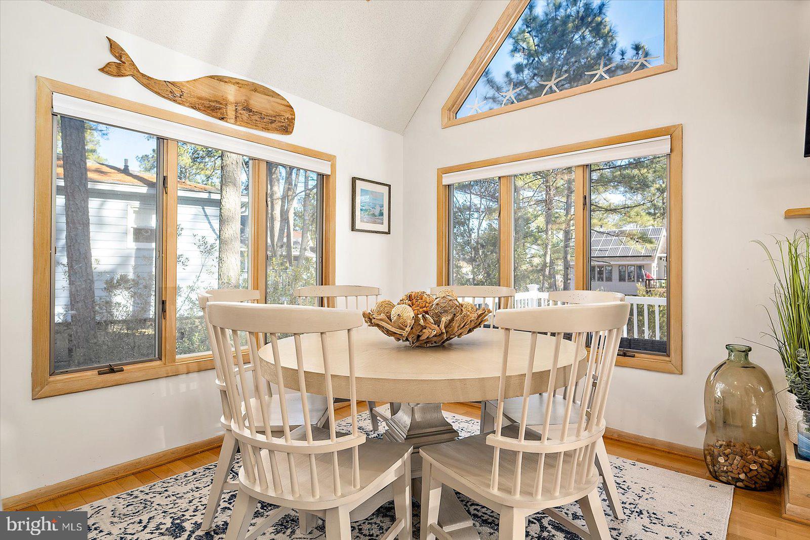943 Pine Tree Lane Bethany Beach, DE 19930 - Photo 19 of 87 Dining area with cathedral ceilings