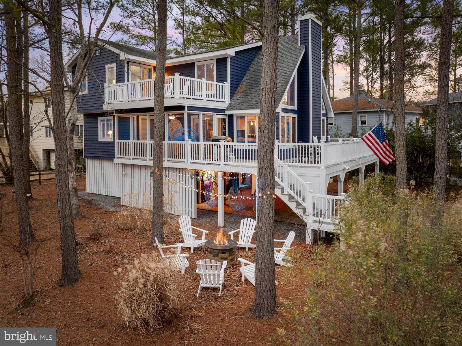 943 Pine Tree Lane Bethany Beach, DE 19930 - Photo 2 of 87 View of the home and backyard