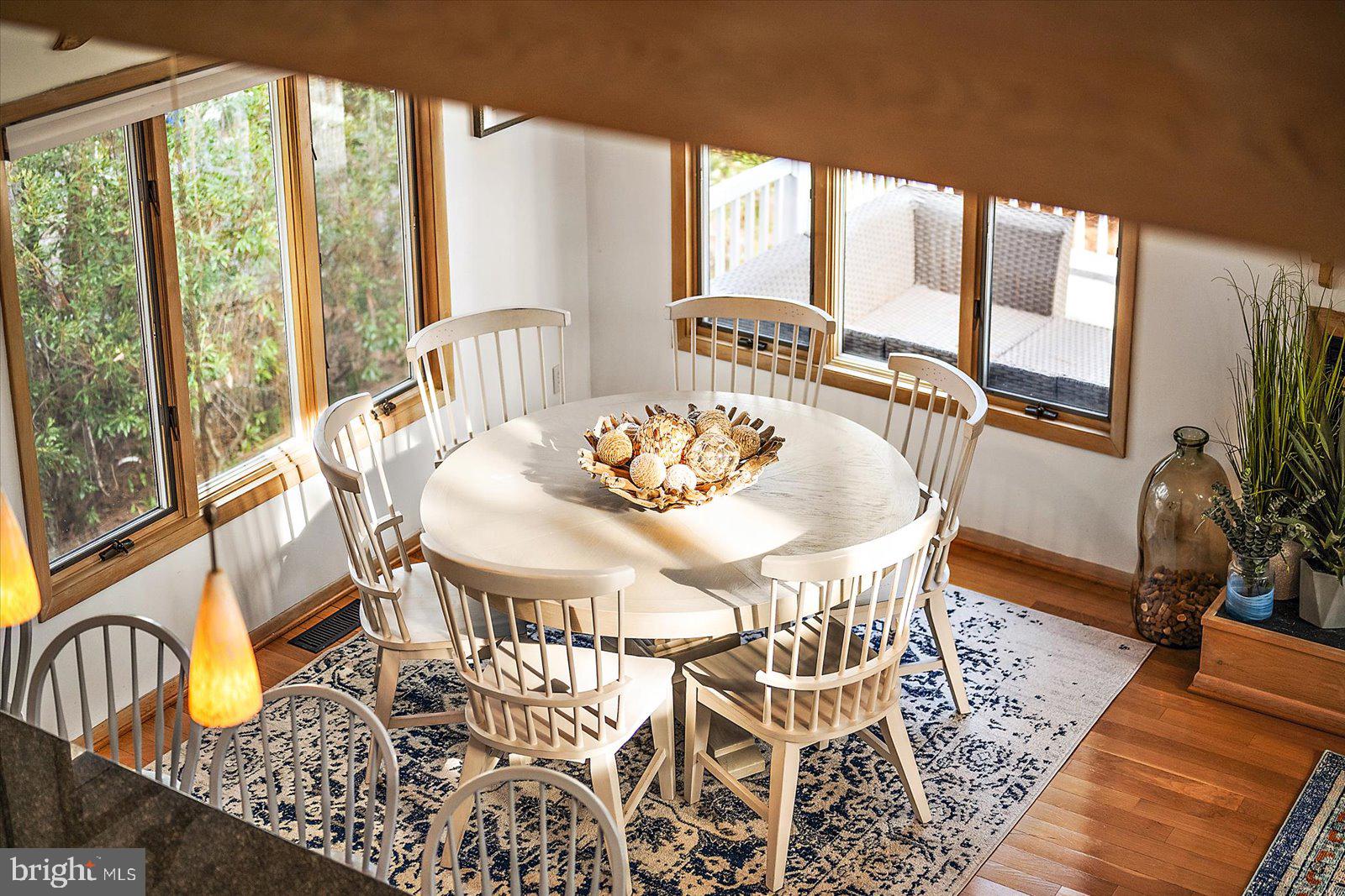 943 Pine Tree Lane Bethany Beach, DE 19930 - Photo 24 of 87 Dining area with hardwood floors