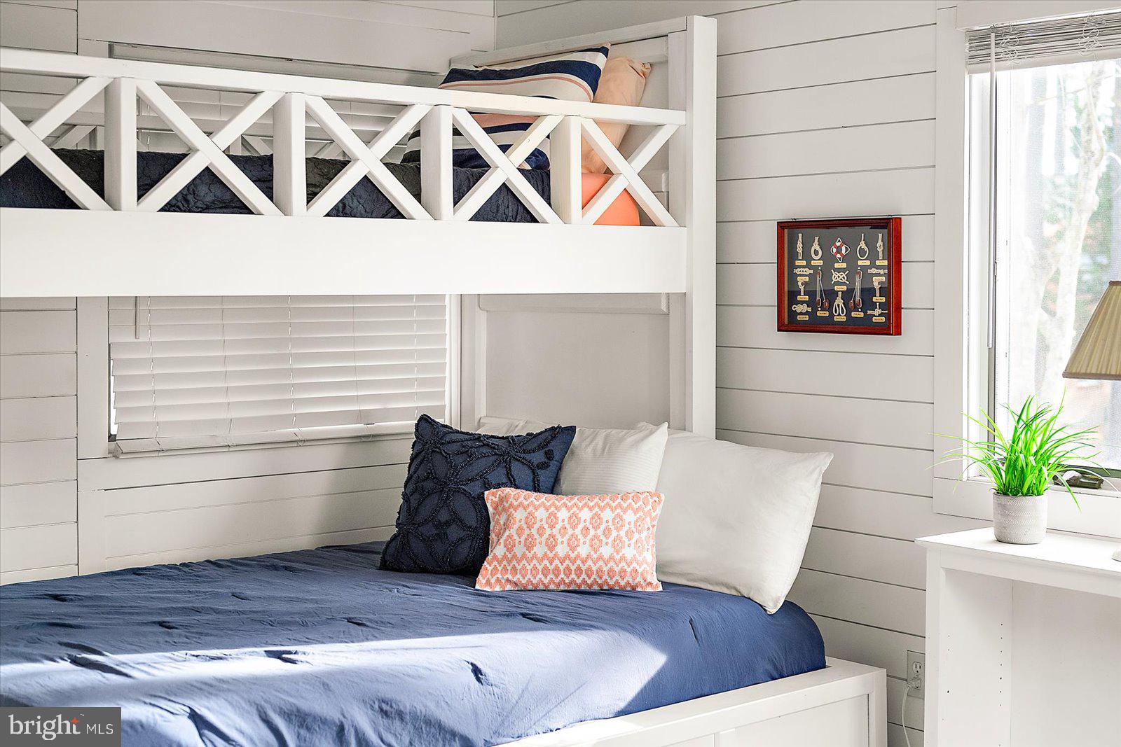 943 Pine Tree Lane Bethany Beach, DE 19930 - Photo 35 of 87 Third bedroom with twin over full bunk beds