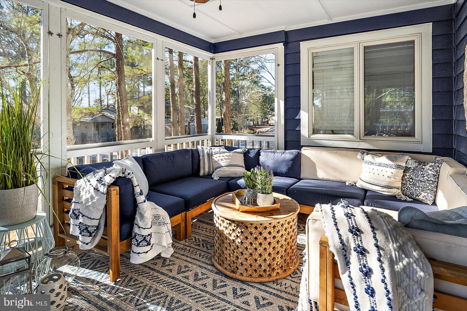 943 Pine Tree Lane Bethany Beach, DE 19930 - Photo 4 of 87 Beautiful screened in porch with great sunlight