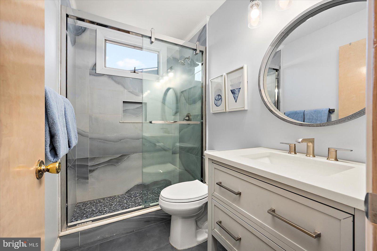 943 Pine Tree Lane Bethany Beach, DE 19930 - Photo 40 of 87 Second bathroom with glass walk-in shower