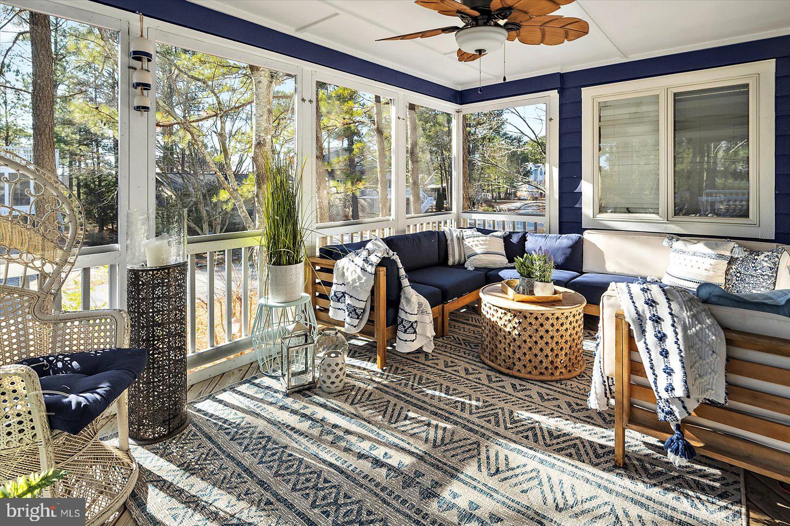 943 Pine Tree Lane Bethany Beach, DE 19930 - Photo 47 of 87 Screened in porch with ceiling fan