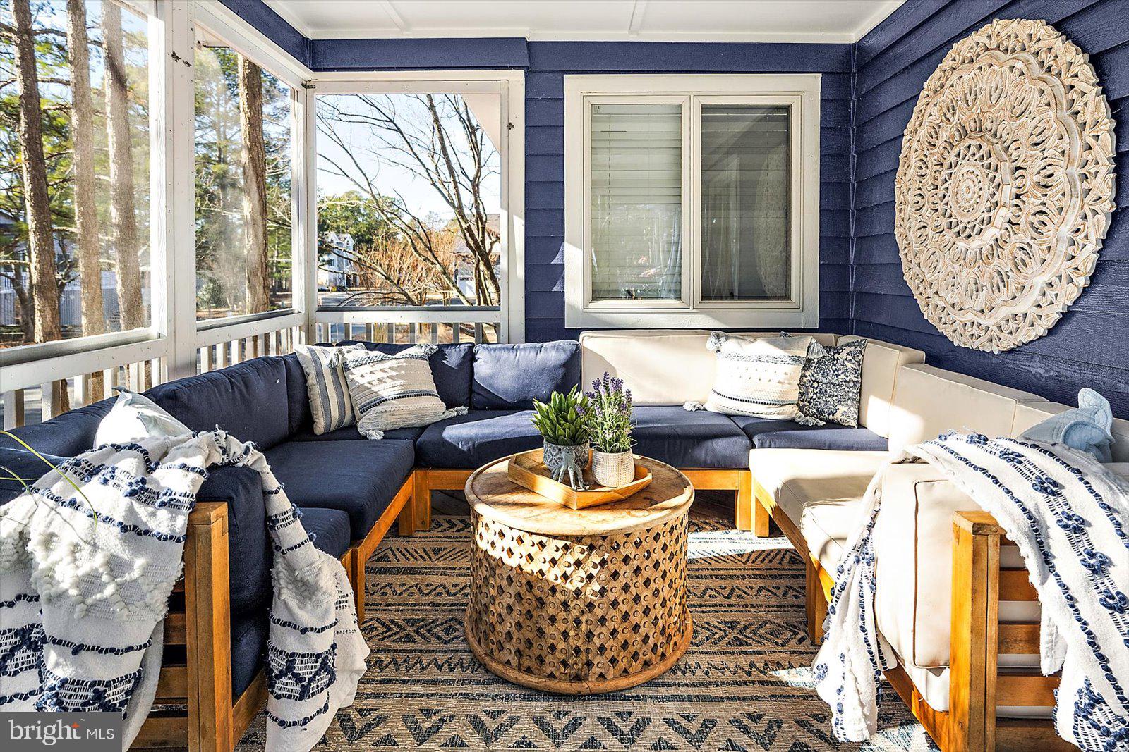 943 Pine Tree Lane Bethany Beach, DE 19930 - Photo 48 of 87 Beautiful porch with lots of natural light
