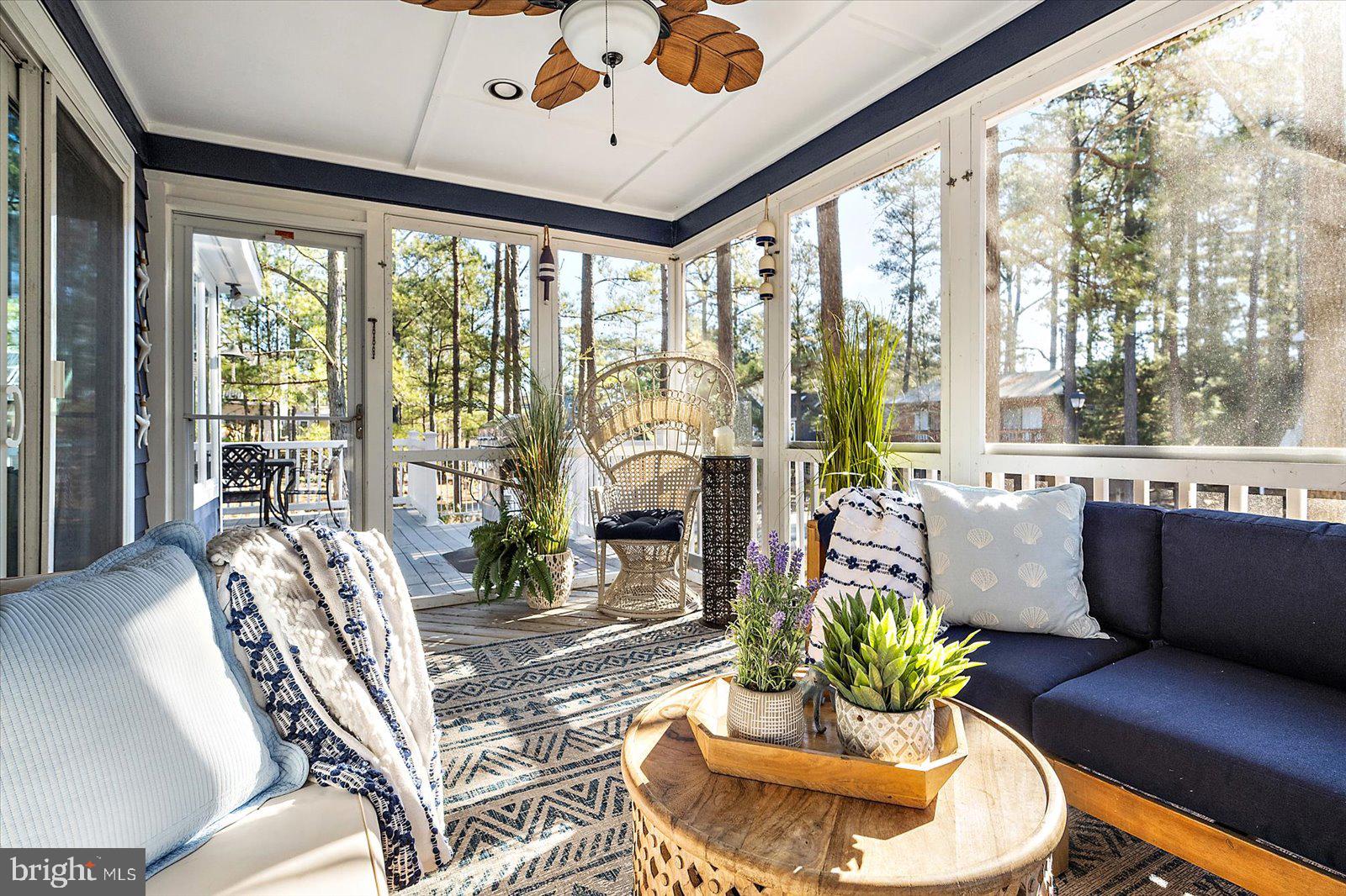 943 Pine Tree Lane Bethany Beach, DE 19930 - Photo 49 of 87 Spacious screened in porch with ceiling fan