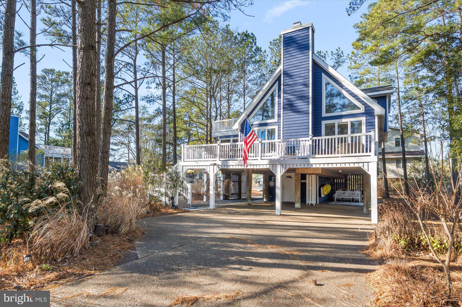 943 Pine Tree Lane Bethany Beach, DE 19930 - Photo 64 of 87 Front view of the home with underhome parking