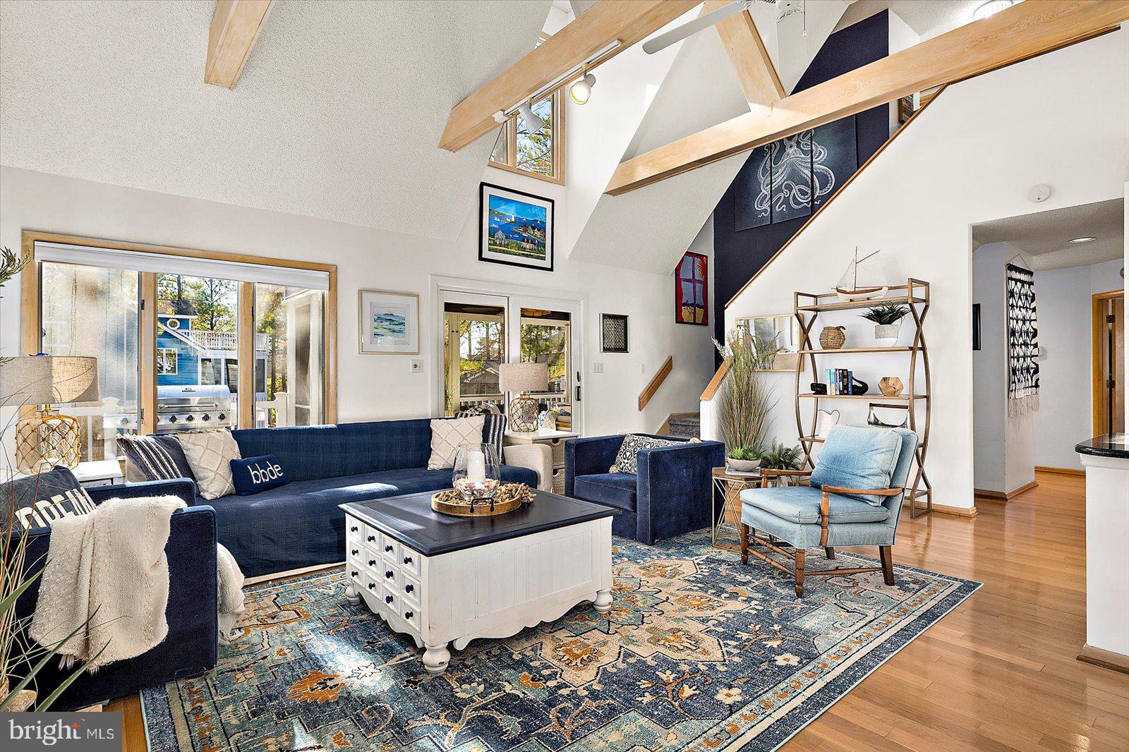 943 Pine Tree Lane Bethany Beach, DE 19930 - Photo 9 of 87 Family room with hardwood floors