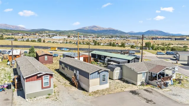 a view of a terrace with a table and chairs