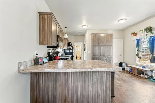 a room with sink and mirror