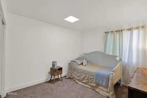 a bathroom with a shower and toilet