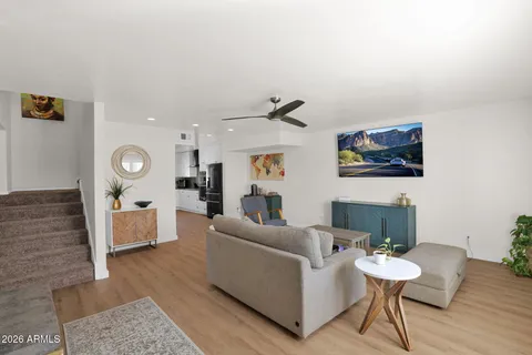 a living room with furniture and a table