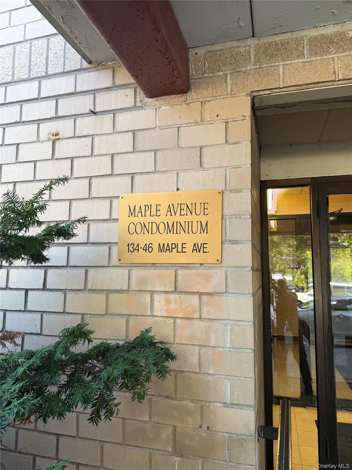 134-46 Maple Avenue, Unit 1C Queens, NY 11355 - Photo 2 of 12 a sign on the wall